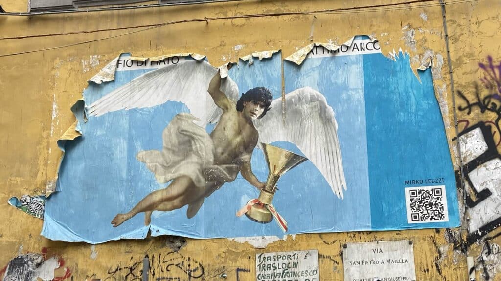 Poster of Diego Maradona on a wall in Naples